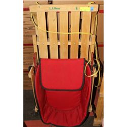 KIDS SLEIGH WITH RED SEAT.