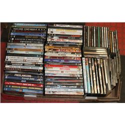LARGE FLAT W/59 DVD MOVIES & 31 CDS