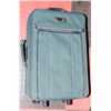 Image 1 : GREEN AMERICAN TOURISTER SUITCASE.