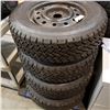 Image 1 : SET OF 4 P215/ 70 R15 STUDDED TIRES ON 5 BOLT RIMS