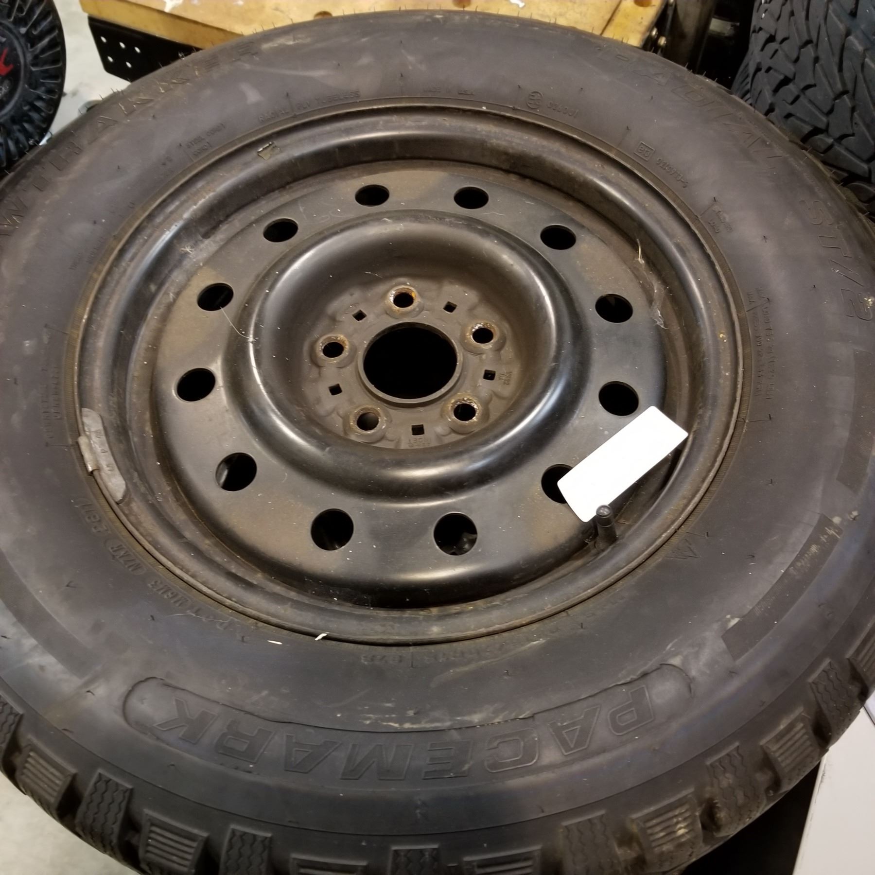 SET OF 4 P215/ 70 R15 STUDDED TIRES ON 5 BOLT RIMS