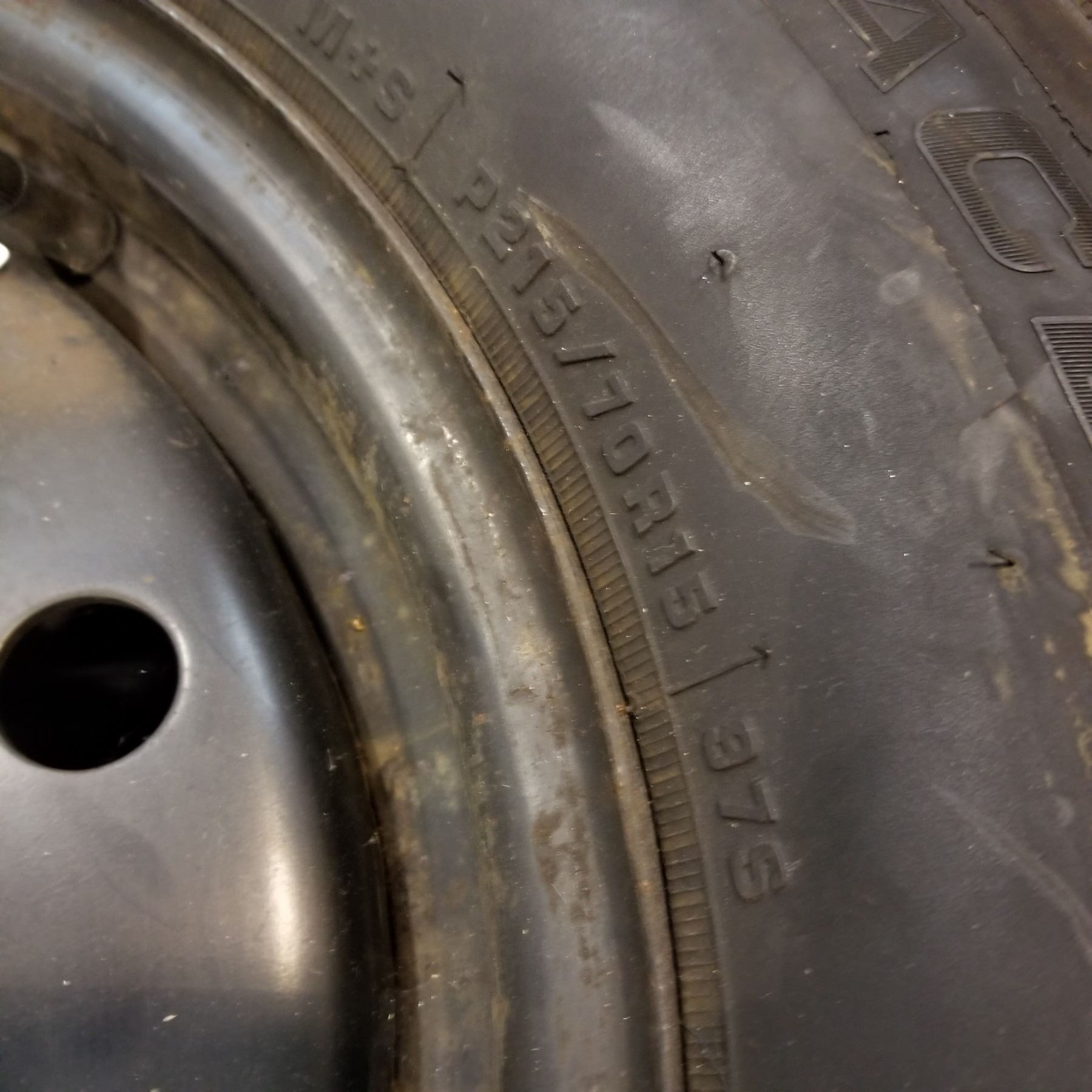 SET OF 4 P215/ 70 R15 STUDDED TIRES ON 5 BOLT RIMS