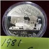 Image 2 : 1981  CANADIAN SILVER DOLLAR "TRAIN" DOLLAR W/ GOLD TONING .500 SILVER