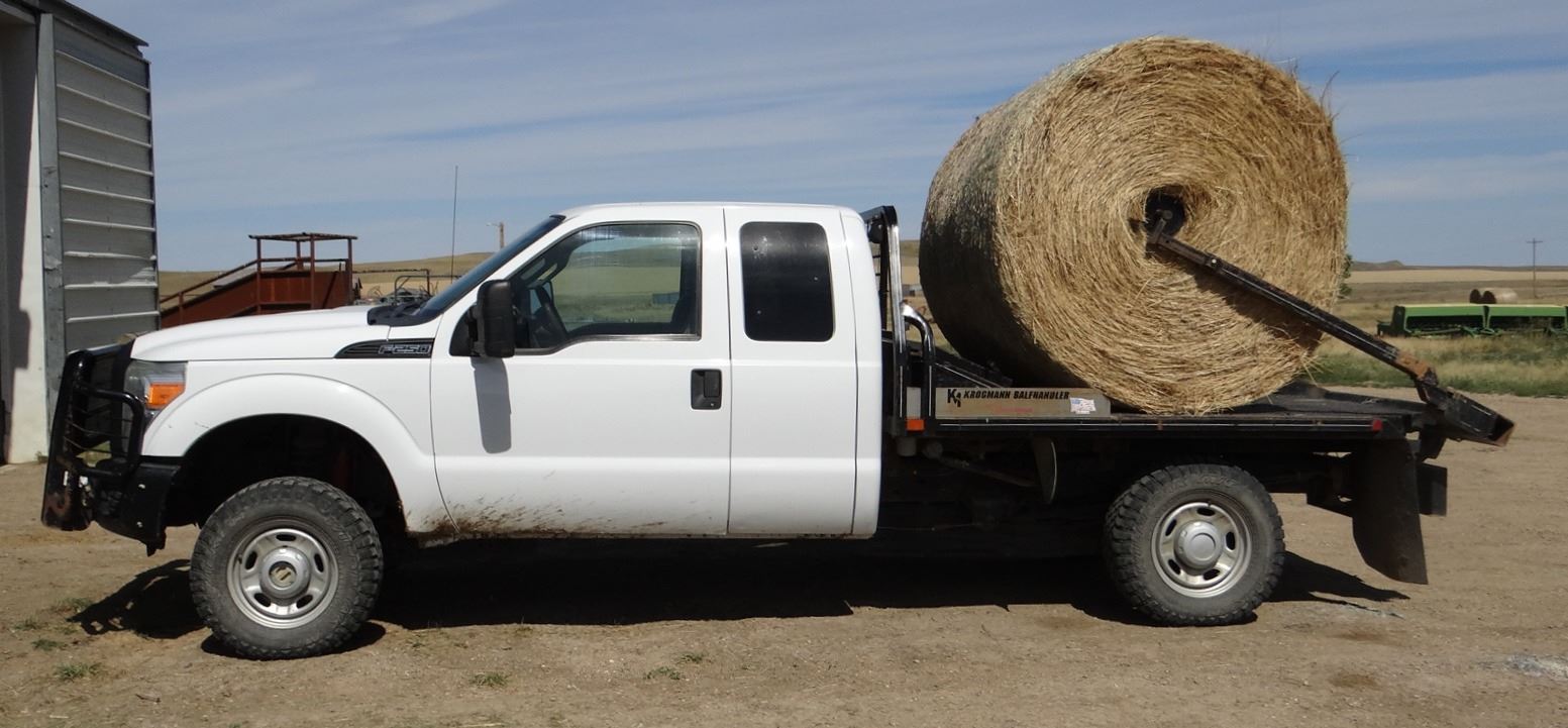 2011 Ford F250 Super Duty, w/ Krogmann bale bed