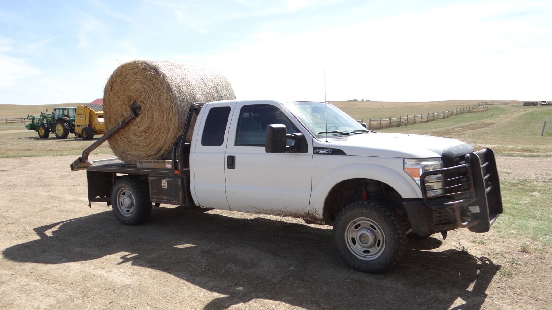 2011 Ford F250 Super Duty, w/ Krogmann bale bed