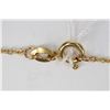 Image 2 : 18kt yellow gold 20" neck chain marked 750 and a 10kt yellow gold cross pendant