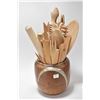 Image 1 : Pottery vase filled with wooden kitchen utensils