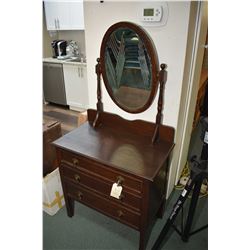Small three drawer mirrored dresser with tear drop pulls, appears to be original finish