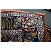 Image 2 : Wool blend area carpet with floral geometric design in shades of green, red and cream etc.