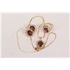 Image 1 : Ladies 10kt yellow gold 18" neck chain and 10kt gold pendant set with amethyst style gemstone plus m
