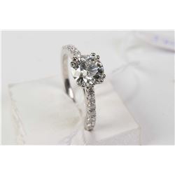 Lady's 14kt white gold diamond engagement ring, set with 1.00ct solitaire laser inscribed Canadian d