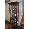 Image 1 : Semi contemporary two door illuminated curio cabinet with mirrored back and adjustable glass shelves