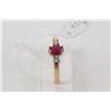 Image 1 : Ladies 10kt yellow gold, ruby and diamond gemstone pendant on a 10kt yellow gold neck chain plus a 1