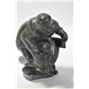 Image 1 : Inuit soapstone carving hunter in battle with a seal, artist signed on base, 9" in height