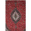 Image 2 : Kashan 100% wool area carpet in as new condition with burgundy background, center medallion, multipl