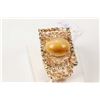 Image 1 : Gent's 10kt yellow gold and cabochon tiger's eye ring