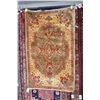 Image 1 : Small wool scatter rug with center medallion in tones of gold, teal and red highlight, 36" X 56"