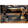 Image 2 : Primitive single drawer baker's table and a oak cased Singer treadle sewing machine