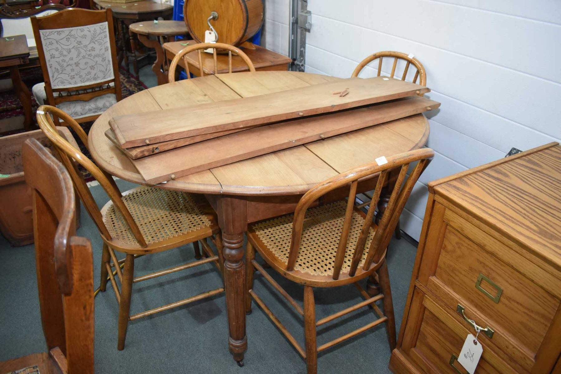 Antique drop leaf dining table with three insert leafs plus a set of
