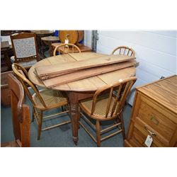 Antique drop leaf dining table with three insert leafs plus a set of four dining chairs