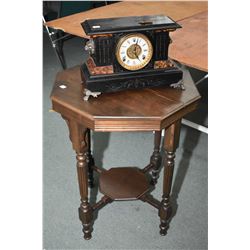 Antique faux slate chiming "Wm. L. Gilbert" mantle clock with cast feet and lion's head decoration, 