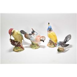 Four large Beswick birds including Woodpecker 9" in height, Cockatoo, Jay etc.