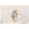 Image 1 : Ladies 14kt yellow and white gold ring set with center .46ct brilliant white diamond and .40ct of si