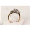 Image 2 : Ladies 14kt yellow and white gold ring set with center .46ct brilliant white diamond and .40ct of si