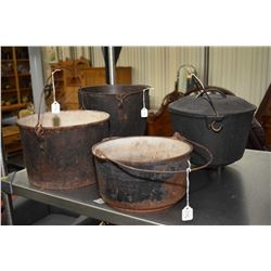 Four cast iron pots including a lidded "Hearth Craft Portore 808 model Spain" footed pot