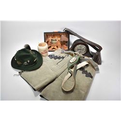 German hat and a pair of lederhosen plus a battery operated wall mount musical and lighted diorama, 