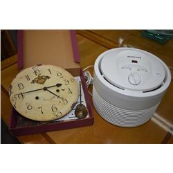 Honeywell humidifier and a Time Works Inc. Copenhagen 13" model CH13P wall clock with original packa