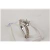 Image 1 : Ladies 14kt white gold and diamond solitaire ring set with approximately .58 brilliant cut white dia