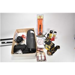 Selection of firearms accessories including hearing protection, cleaning solvents, oil, cleaning pat