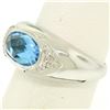 Image 2 : 14K White Gold Oval Checkerboard Cut Bezel Blue Topaz Solitaire & Diamond Ring