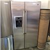 Image 1 : STAINLESS STEEL GE SIDE BY SIDE FRIDGE WITH WATER AND ICE DISPENSER TESTED AND WORKING GUARANTEED