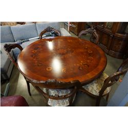 IN LAID ROUND COFFEE TABLE W/ HIGHLY CARVED BASE AND 6 CARVED BALLOON BACK CHAIRS