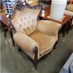 HIGHLY CARVED FRENCH PROVINCIAL ANTIQUE TUFTED ARM CHAIR