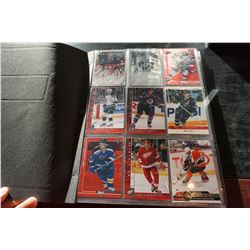 BINDER OF HOCKEY INSERT AND STAR PLAYER CARDS, BOOK VALUE $700