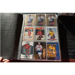 BINDER OF HOCKEY ROOKIE CARDS, BOOK VALUE $800