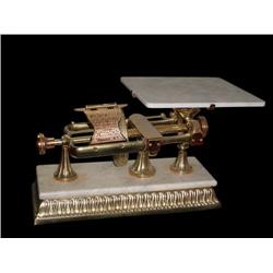 The Micrometer scale, marble and brass