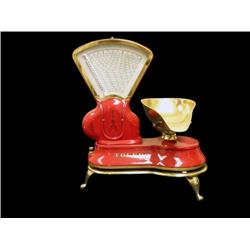 Early Toledo candy scale with 3 legged base