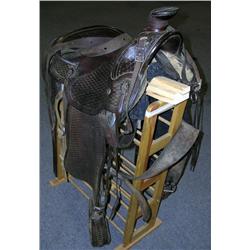 1960s hand-tooled leather saddle with girth strap