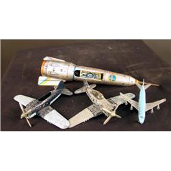 1 lot of 3 Hubley toy airplanes and a rocket