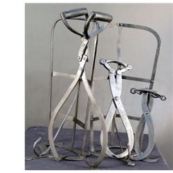 1 lot of 5 pieces.. 3 ice-tongs and 2 early saddle racks