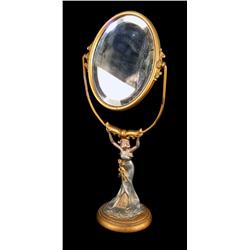 Hand mirror  depicting a woman