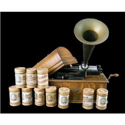 Victrola cylinder player with horn and 37 records