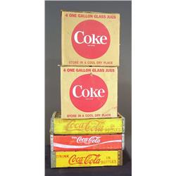 2 cases of 4, 1 gal Coke syrup bottles and 3 cases