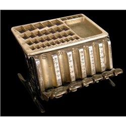 Early cast-iron Statts coin-changer