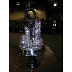 6 bottle Cruet Set   bottles have purpled