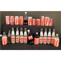 1 lot of Coca-Cola cans and contemporary bottles